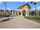 Grand entrance to the community with a paved driveway at 12460 Ghiberti Cir # 202, Venice, FL 34293