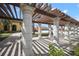 Relaxing pergola with brick pavers and views of the pool at 12460 Ghiberti Cir # 202, Venice, FL 34293