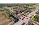 Community entrance with palm trees and guardhouse at 12460 Ghiberti Cir # 202, Venice, FL 34293
