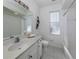 Clean bathroom with a bathtub and shower combination at 202 Lake Victoria Ct, Englewood, FL 34223