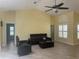 Bright living room showcasing neutral walls, and furniture set at 217 Carriage House Ln # 217, Nokomis, FL 34275