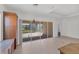 Bright kitchen with lots of cabinet space and sliding doors to the patio at 329 Savona Way, North Venice, FL 34275