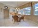 Cozy breakfast nook with casual seating and a view of the lanai at 594 Sawgrass Bridge Rd, Venice, FL 34292