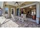 Outdoor patio with dining area, perfect for enjoying al fresco meals and entertaining guests at 594 Sawgrass Bridge Rd, Venice, FL 34292