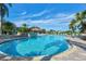 Large community pool featuring beach entry and several lounge chairs at 594 Sawgrass Bridge Rd, Venice, FL 34292
