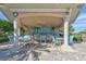 Poolside bar and lounge area with seating at 594 Sawgrass Bridge Rd, Venice, FL 34292