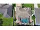 Aerial view showing house, pool, and backyard at 5280 E Sunnydale Cir, Sarasota, FL 34233