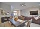 Open dining area with a large table, seating for six and view of living room at 5280 E Sunnydale Cir, Sarasota, FL 34233