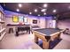 Game Room with pool table, foosball, and bar area at 5280 E Sunnydale Cir, Sarasota, FL 34233