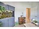 Office with large fish tank and built-in cabinets at 5280 E Sunnydale Cir, Sarasota, FL 34233