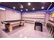 Game room with pool table, foosball, and bar area at 5280 E Sunnydale Cir, Sarasota, FL 34233