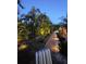 Landscaped walkway leading to the pool area, perfect for evening strolls at 5280 E Sunnydale Cir, Sarasota, FL 34233