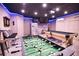 Basement game room with foosball table and pool table at 5280 E Sunnydale Cir, Sarasota, FL 34233