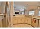 Modern kitchen features stainless steel appliances and an abundance of counter space at 5280 E Sunnydale Cir, Sarasota, FL 34233
