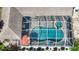 An aerial close-up of a kidney-shaped pool with a spa at 5280 E Sunnydale Cir, Sarasota, FL 34233