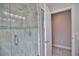 Clean shower with glass enclosure and mosaic tile at 5280 E Sunnydale Cir, Sarasota, FL 34233