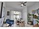 Home office with built-in shelving and large window at 5280 E Sunnydale Cir, Sarasota, FL 34233