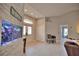 Spacious entryway with a built-in fish tank and plenty of natural light at 5280 E Sunnydale Cir, Sarasota, FL 34233