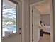 View of a refreshing pool from an interior doorway at 5280 E Sunnydale Cir, Sarasota, FL 34233