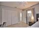 Bedroom with large closet and access to exterior at 5280 E Sunnydale Cir, Sarasota, FL 34233