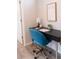 Functional home office space with a modern desk, comfortable chair, and ample natural light at 17501 Belle Eden Way, Nokomis, FL 34275