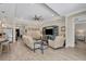 Bright and airy living room with open floor plan and tile flooring at 253 Calmar Way, Nokomis, FL 34275