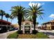 Venice, Florida town square with palm trees and shops at 501 Tamiami N Trl # 201, Venice, FL 34285