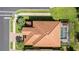 Aerial view of home with pool and landscaped yard at 19304 Bluff Dr, Venice, FL 34292