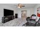 Home theater with comfortable seating and large screen TV at 19304 Bluff Dr, Venice, FL 34292