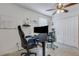 Home office with two desks, ergonomic chairs, and ample workspace at 19304 Bluff Dr, Venice, FL 34292