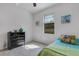 Well-lit bedroom with a comfortable bed and ample storage at 19304 Bluff Dr, Venice, FL 34292