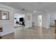 Open hallway leading to bedrooms and a media room at 19304 Bluff Dr, Venice, FL 34292