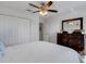 Bright bedroom with a dresser, double closet, and comfortable bed at 19304 Bluff Dr, Venice, FL 34292