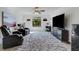 Home theater with plush seating and large screen TV at 19304 Bluff Dr, Venice, FL 34292