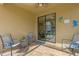 Relaxing covered patio with seating area and pool view at 19304 Bluff Dr, Venice, FL 34292