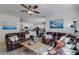 Spacious living room featuring comfortable leather sofas at 19304 Bluff Dr, Venice, FL 34292