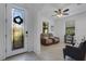 Entryway with a stylish glass door and view into living area at 19304 Bluff Dr, Venice, FL 34292