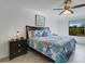 Main bedroom with a king-size bed and coastal decor at 19304 Bluff Dr, Venice, FL 34292