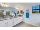 Spa-like bathroom with a double vanity and large soaking tub at 19304 Bluff Dr, Venice, FL 34292