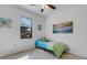 Cozy bedroom with a twin bed and calming coastal decor at 19304 Bluff Dr, Venice, FL 34292