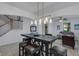 Elegant dining room with a view to living room and staircase at 19304 Bluff Dr, Venice, FL 34292