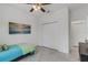 Spacious bedroom with double doors leading to the closet at 19304 Bluff Dr, Venice, FL 34292