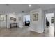 Upper level hallway with tile floors and multiple doorways at 19304 Bluff Dr, Venice, FL 34292