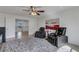 Spacious home theater with a large TV and comfortable seating at 19304 Bluff Dr, Venice, FL 34292