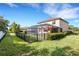 Spacious backyard featuring a private pool and fenced area at 19304 Bluff Dr, Venice, FL 34292