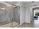 Large walk-in shower with glass enclosure and tile surround at 19304 Bluff Dr, Venice, FL 34292
