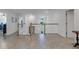 Spacious upper hallway with tile floors and natural light at 19304 Bluff Dr, Venice, FL 34292