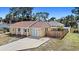 Cute yellow house with fenced yard and spacious driveway at 2616 Osage Rd, Venice, FL 34293