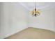 Spacious dining room with neutral walls and carpeting at 3314 Wood Thrush Dr # 124, Punta Gorda, FL 33950