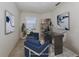 Virtually staged home office with a desk and comfortable seating at 1622 Monarch Dr # 1622, Venice, FL 34293